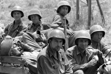 US Army personnel patrolling through Italy during World War 2