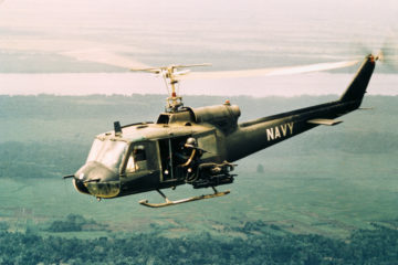 American Gunners Firing from Helicopter in Vietnam