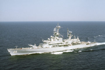 A port bow view of the guided missile cruiser USS BELKNAP (CG-26), flagship of the 6th Fleet, underway.