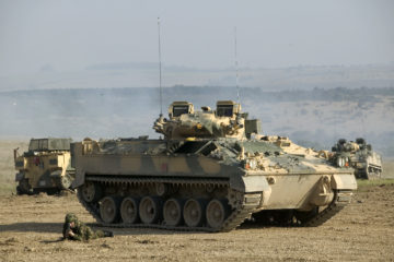 A Warrior Infantry Fighting Vehicle is pictured during a Firepower Demonstration at Warminster, Salisbury Plain.