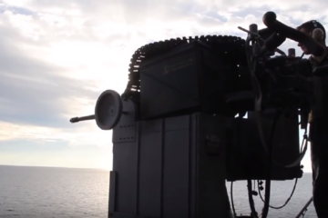 US Sailors Firing the Powerful Mk38/ M242 Bushmaster on a Boat