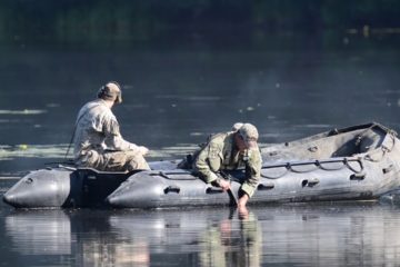 Sniper teams from the Czech Republic and Poland conduct the water shoot event of the European Best Sniper Team Competition at Grafenwoehr, Germany, July 24, 2019.